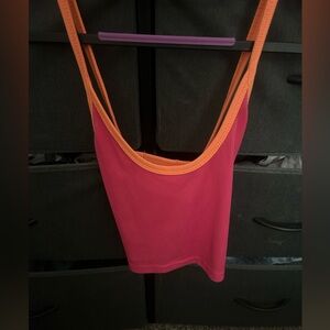 Tank Top. Criss Crosses in the back